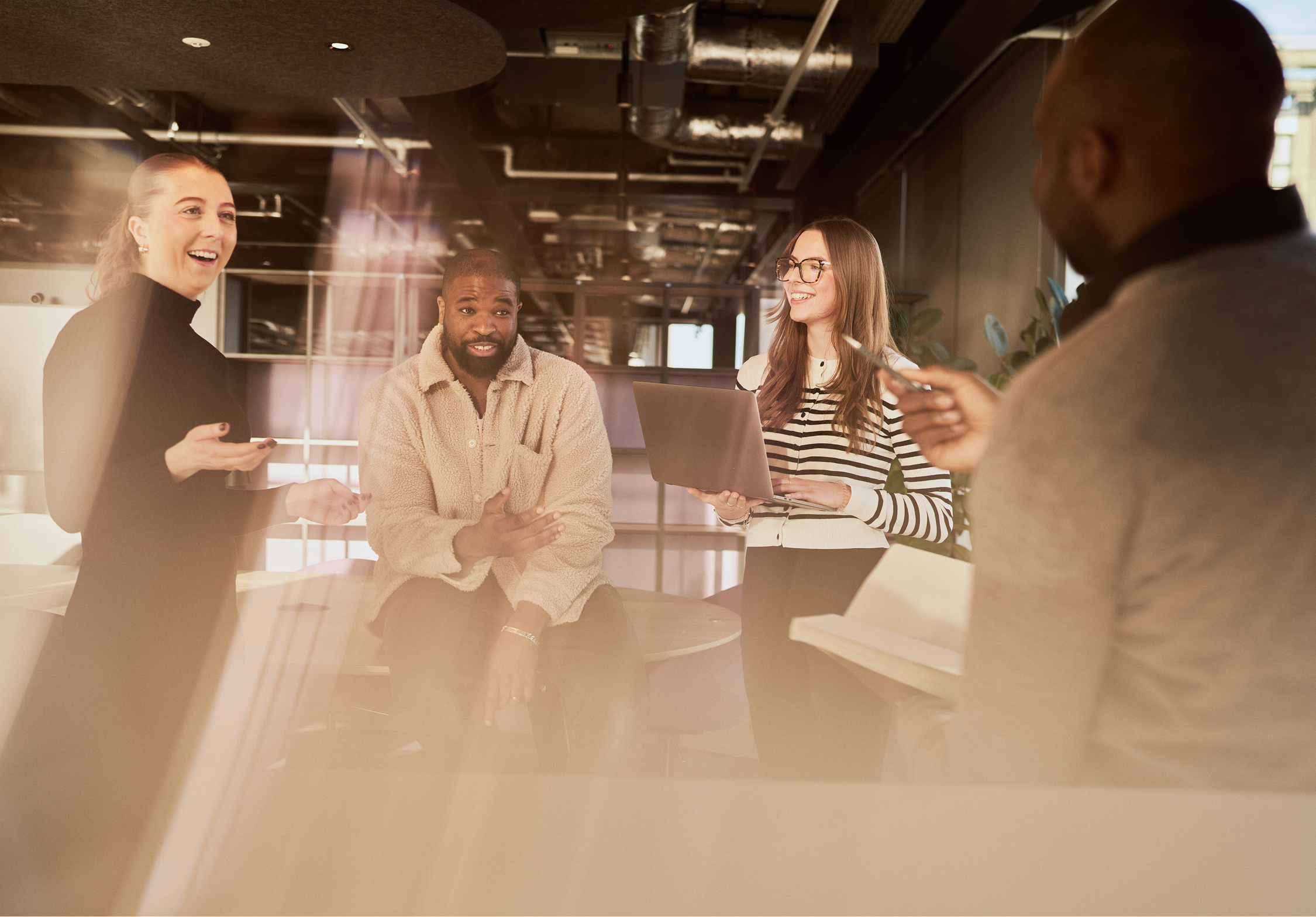A group of people in a working environment