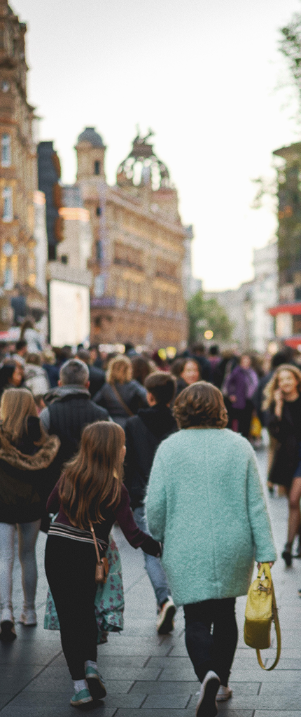 Women walking in a busy high street