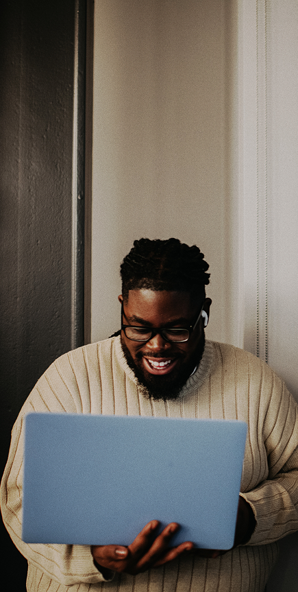 A man using his laptop