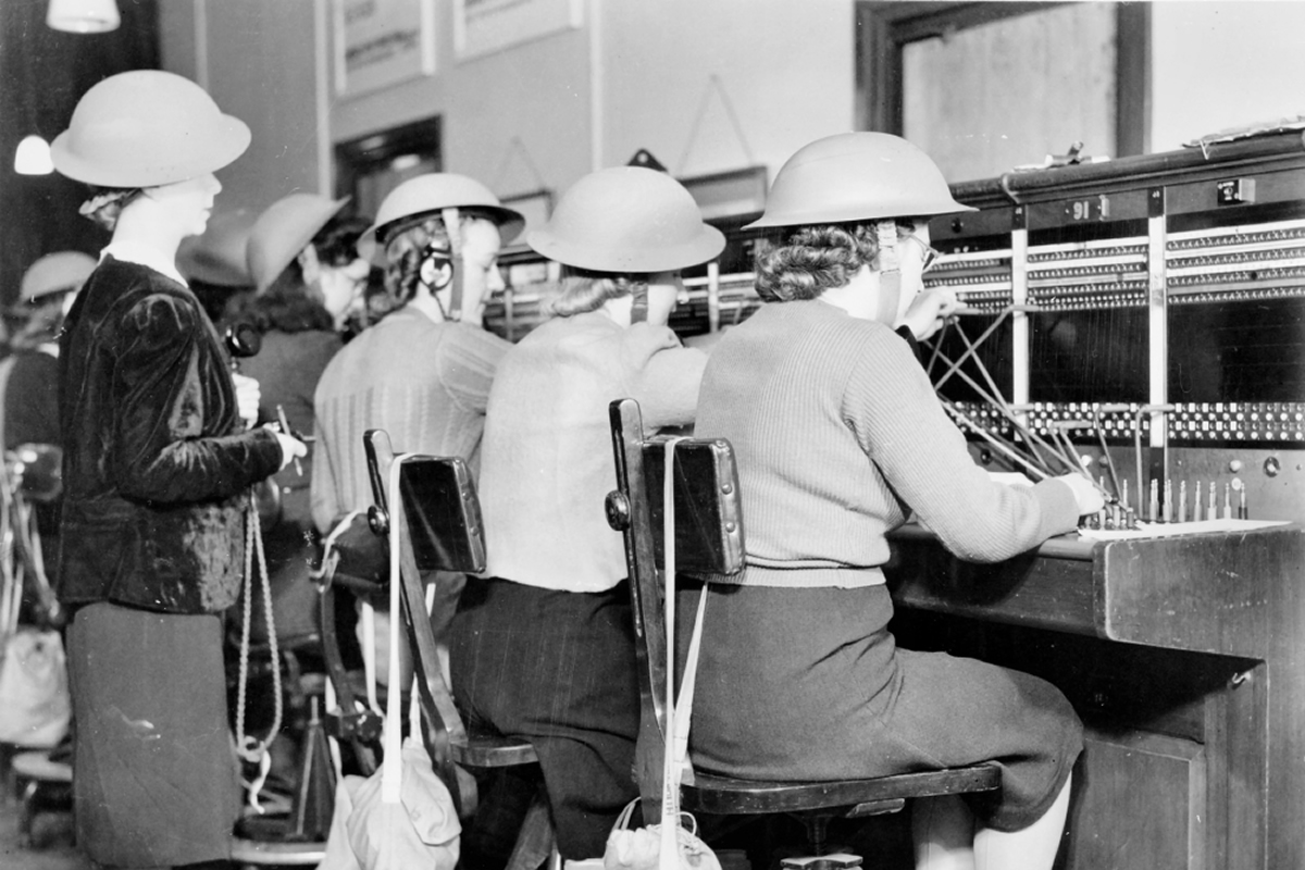 Telephonists wearing helmets during WW11