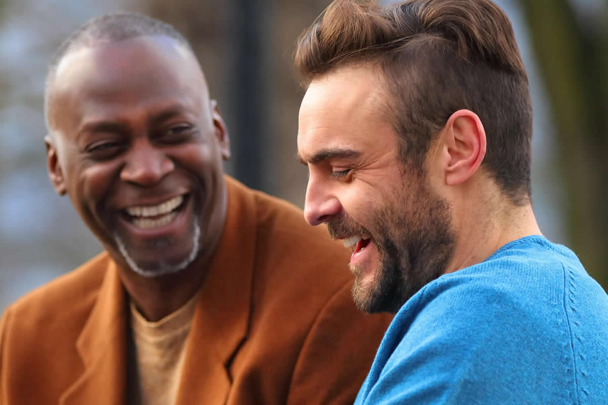 Two men laughing