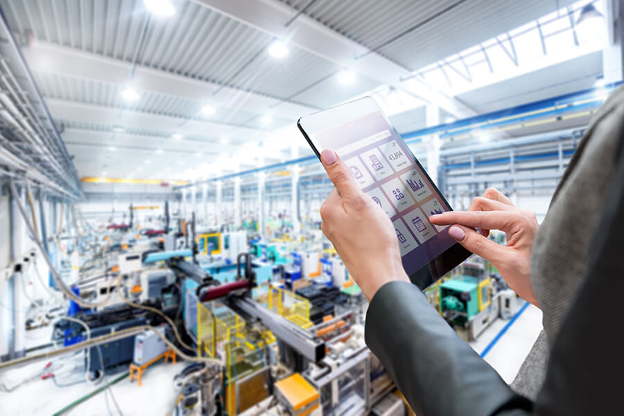 Using a tablet in a manufacturing factory