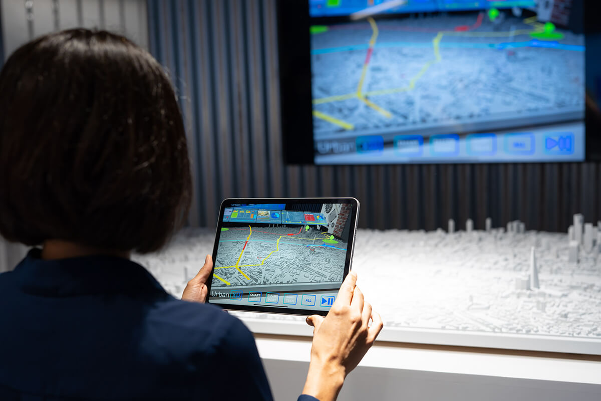 Woman working with a tablet with networks