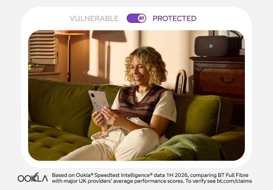 A person using a tablet at home, representing BT Broadband with advanced threat protection.